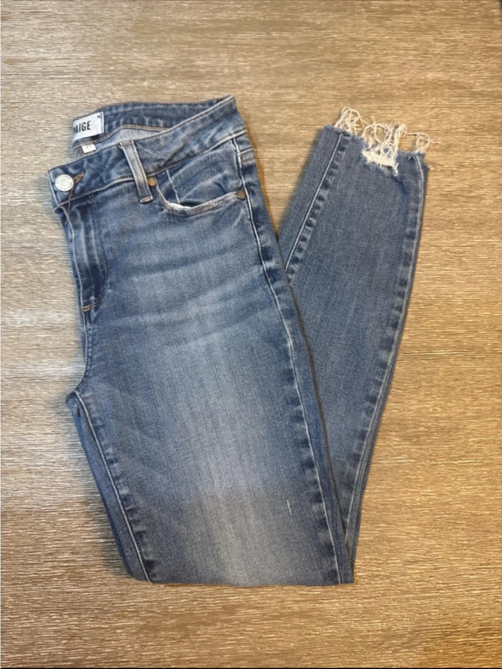 PAIGE MEDIUM BLUE SKINNY JEANS WITH FRAYED HEM